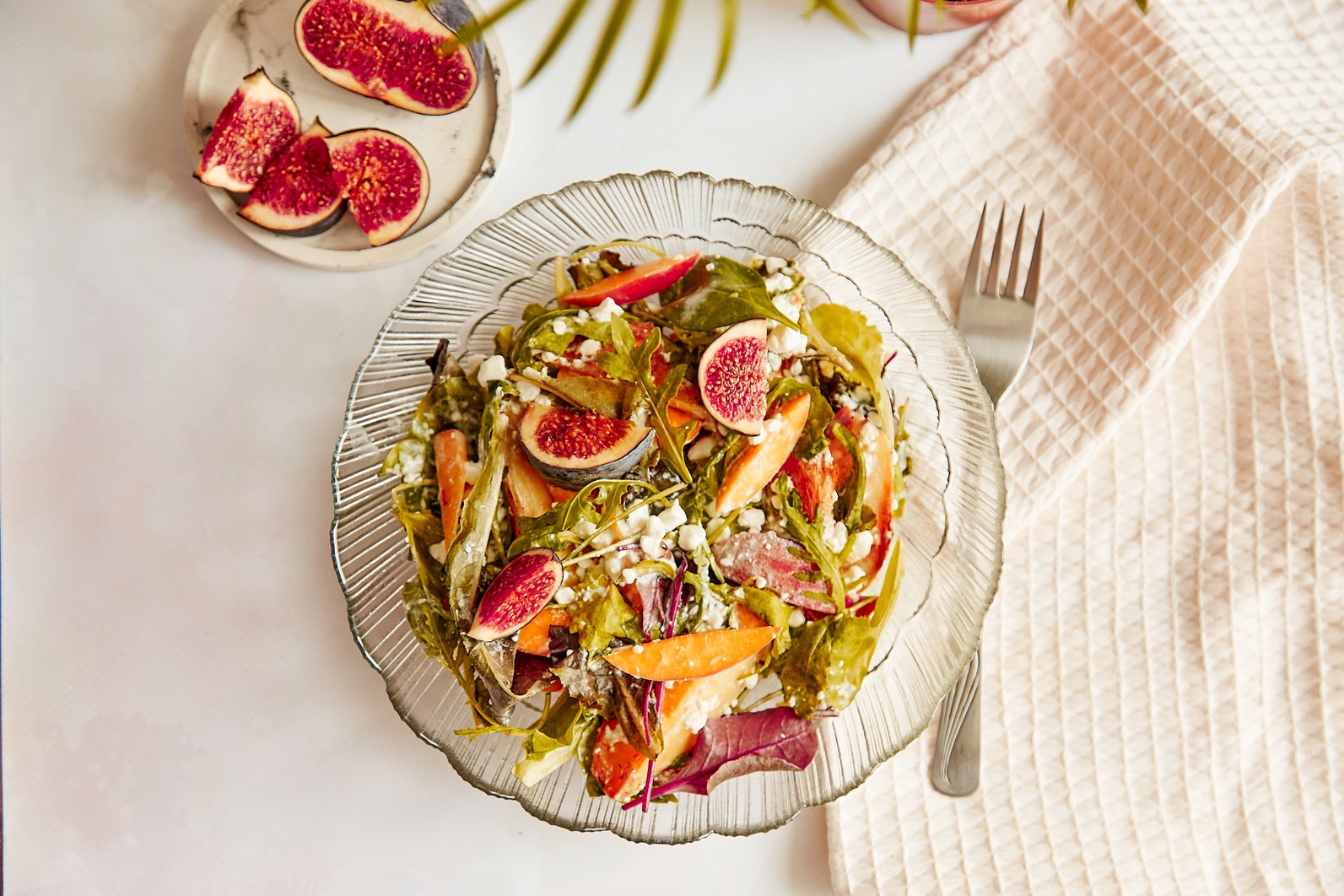 Aesthetic salad of potato, arugula, grain cheese, peach and figs. Mediterranean healthy dish, vegan fresh salad, easy recipe